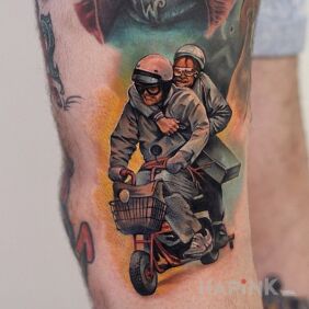Tattoo Dumb and dumber on the upper arm motif: characters