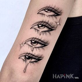 Tattoo Tear on the upper arm motif: other style: graphic / illustrative