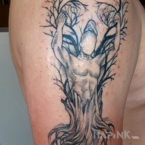 Tattoo Atlas on the upper arm motif: skulls style: graphic / illustrative