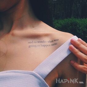 Tattoo What will happen next? on the collarbone motif: lettering style: calligraphy