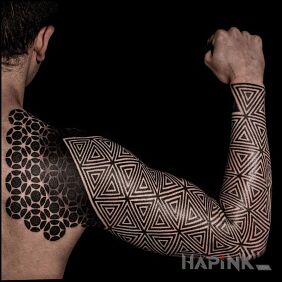Tattoo Triangles on the upper arm motif: black and gray style: geometric
