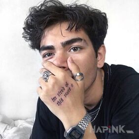 Tattoo Tired of living on the hand motif: lettering style: calligraphy