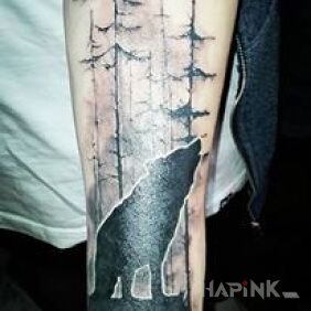Tattoo Wolf in the forest on the forearm motif: animals