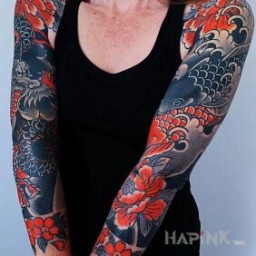 Tattoo Two sleeves in Japanese on the upper arm motif: dragons style: japanese / irezumi