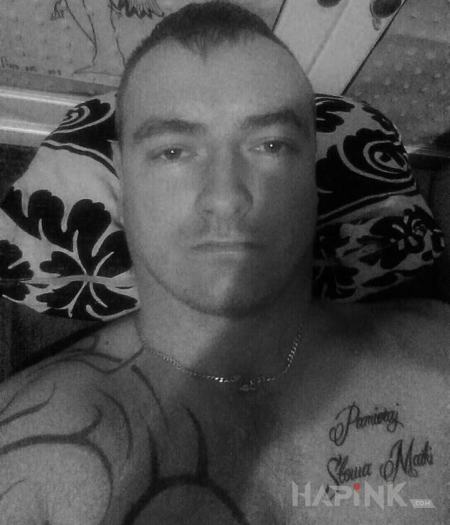 Tattoo Wszystko w trakcie realizacji :) in lettering motif and tribal style on the chest