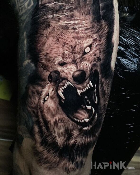 Tattoo Wilki in 3D motif and realistic style on the upper arm