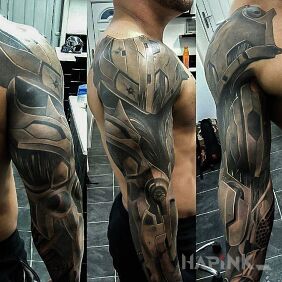 Tattoo Cyborg hand on the forearm motif: 3D style: biomechanics