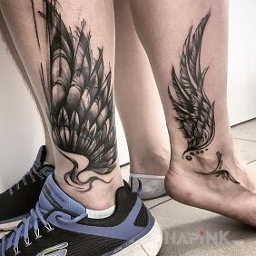 Tattoo Wings near the ankle motif: black and gray style: sketch