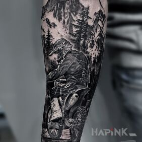 Tattoo Motocross on the forearm motif: black and gray style: realistic
