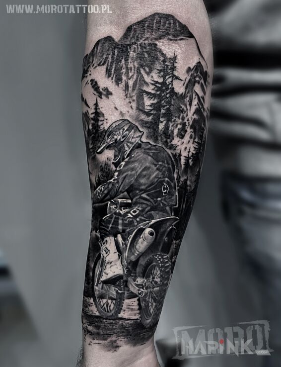 Tattoo Motocross in black and gray motif and realistic style on the forearm