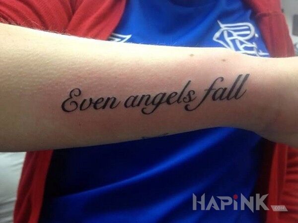 Tattoo Even angels fall in lettering motif on the forearm