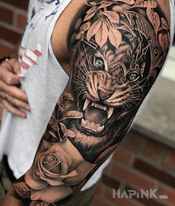Tattoo Paszcza tygrysa in flowers motif and realistic style on the upper arm