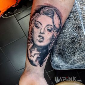 Tattoo Marilyn Monroe on the forearm motif: faces style: realistic