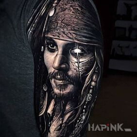 Tattoo Jack Saprrow on the upper arm motif: faces style: realistic