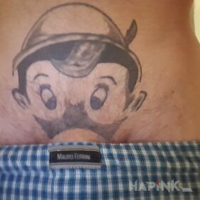 Tattoo Pinocchio on the stomach motif: characters