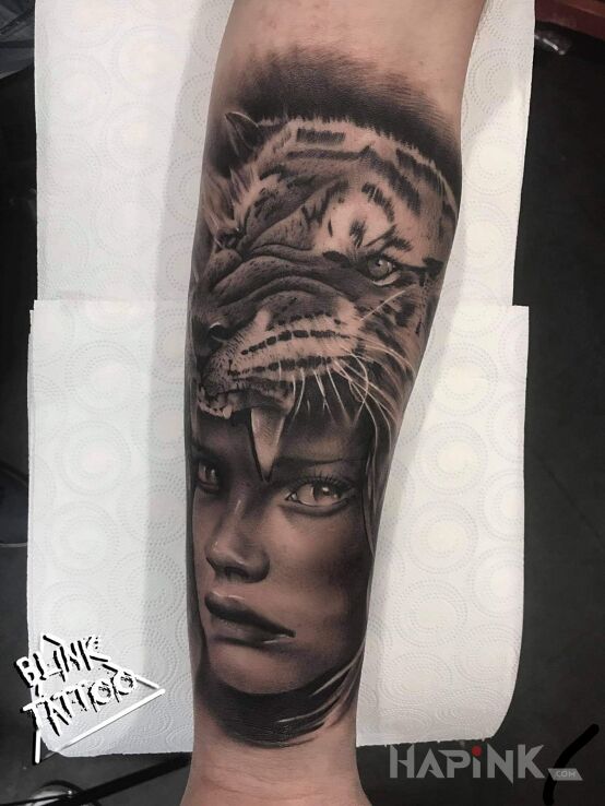 Tattoo Tatuaż na przedramieniu in black and gray motif and realistic style on the forearm