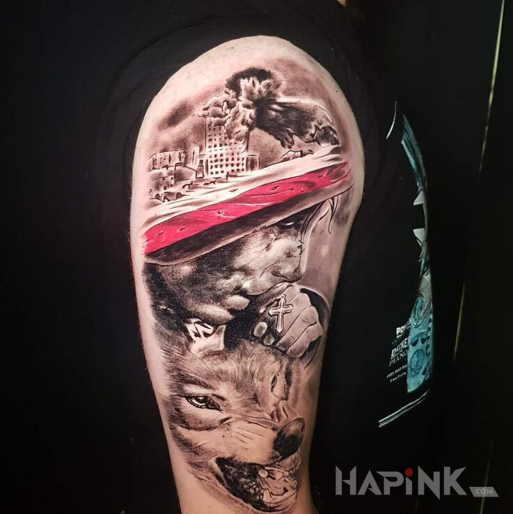 Tattoo Patriotyczny in war motif and realistic style on the upper arm