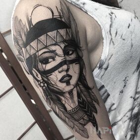 Tattoo Indian woman on the upper arm motif: characters