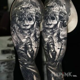 Tattoo Defeated knight on the upper arm motif: black and gray style: realistic