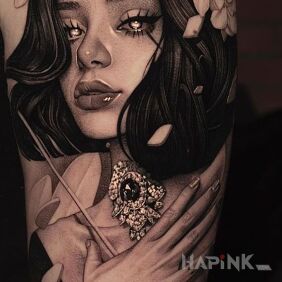 Tattoo Lovely lady on the upper arm motif: black and gray style: realistic