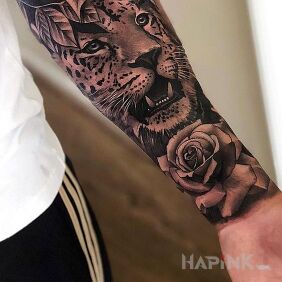 Tattoo Leopard on the forearm motif: black and gray style: realistic