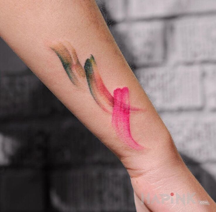 Tattoo Kolorowe szlaczki in other motif on the forearm