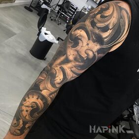 Tattoo Sculpted face on the forearm motif: faces style: realistic