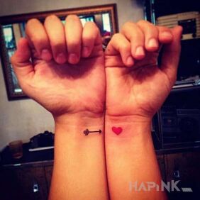 Tattoo A shot to the heart on the wrist motif: Love style: minimalistic
