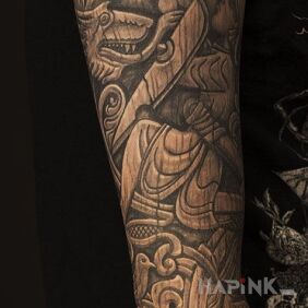 Tattoo Sleeve on the pattern of old wooden carvings on the forearm motif: sleeves