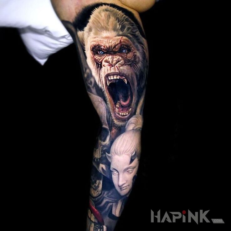 Tattoo Wkurzony George in faces motif and realistic style on the upper arm