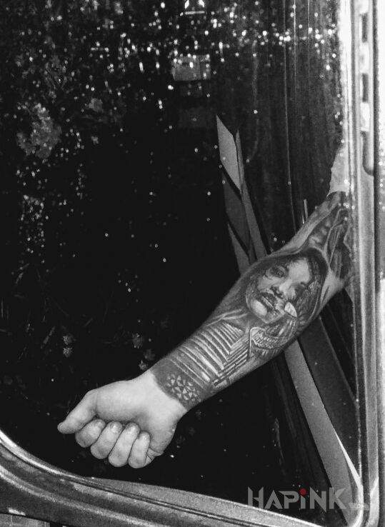 Tattoo Tatuaż, rękaw in black and gray motif and realistic style on the forearm