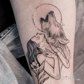 Tattoo The nature of the wolf on the forearm motif: flowers style: graphic / illustrative