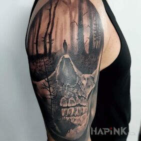 Tattoo A canopy in the forest on the upper arm motif: dark style: realistic