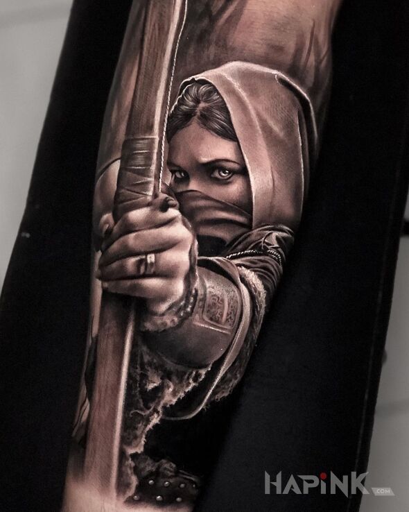 Tattoo Strzelec in characters motif and realistic style on the forearm