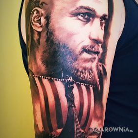 Tatuaż Ragnar na przedramieniu motyw: twarze styl: realistyczne