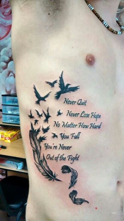 Tattoo Nie wolno sie poddawac in black and gray motif and graphic / illustrative style on the ribs