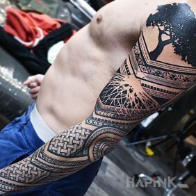 Tattoo Delicate Polynesia on the forearm motif: black and gray style: Polynesian