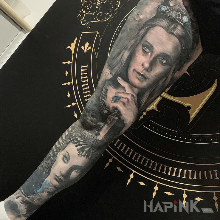 Tattoo Kobiece lica in faces motif and realistic style on the forearm