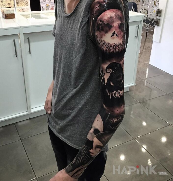 Tattoo Miasteczko Halloween in sleeves motif on the upper arm