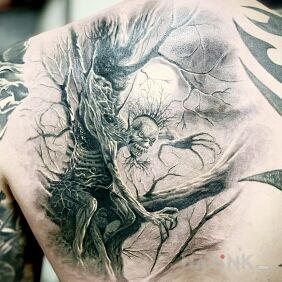 Tattoo Iron Maiden - fear of the dark on the shoulder blades motif: 3D style: realistic