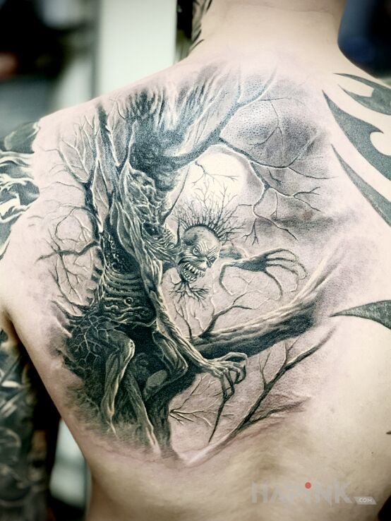 Tattoo Iron Maiden - fear of the dark in black and gray motif and realistic style on the back