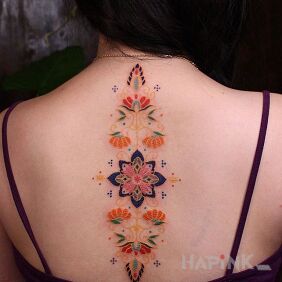 Tattoo Embroiderer on the back motif: colorful style: embroidered