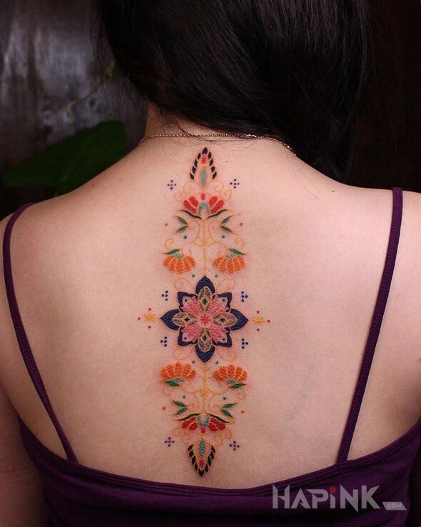Tattoo Haftowanka in colorful motif and embroidered style on the back