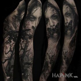 Tattoo Butterfly on the lips on the upper arm motif: black and gray style: realistic