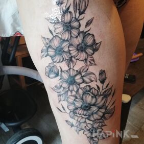 Tattoo 4 tattoos in a lifetime on the leg motif: flowers style: graphic / illustrative