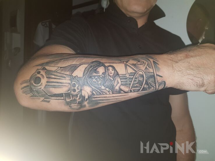 Tattoo Cadilac in black and gray motif and graphic / illustrative style on the forearm