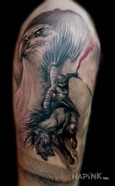 Tattoo Husaria in patriotic motif on the upper arm
