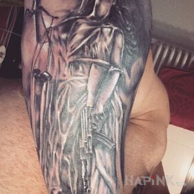 Tattoo Temida with AK47 on the forearm motif: black and gray style: realistic