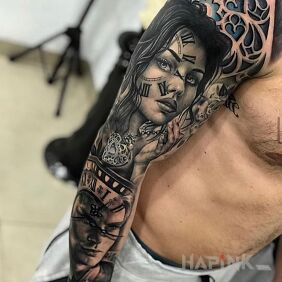 Tattoo Clockwork eye on the forearm motif: black and gray style: realistic