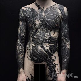 Tattoo Huge beast on the upper arm motif: dark style: graphic / illustrative